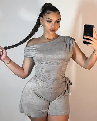 TRISHIA Oblique Off-Shoulder Tie-Waist Romper-Meeba &amp; Mae
